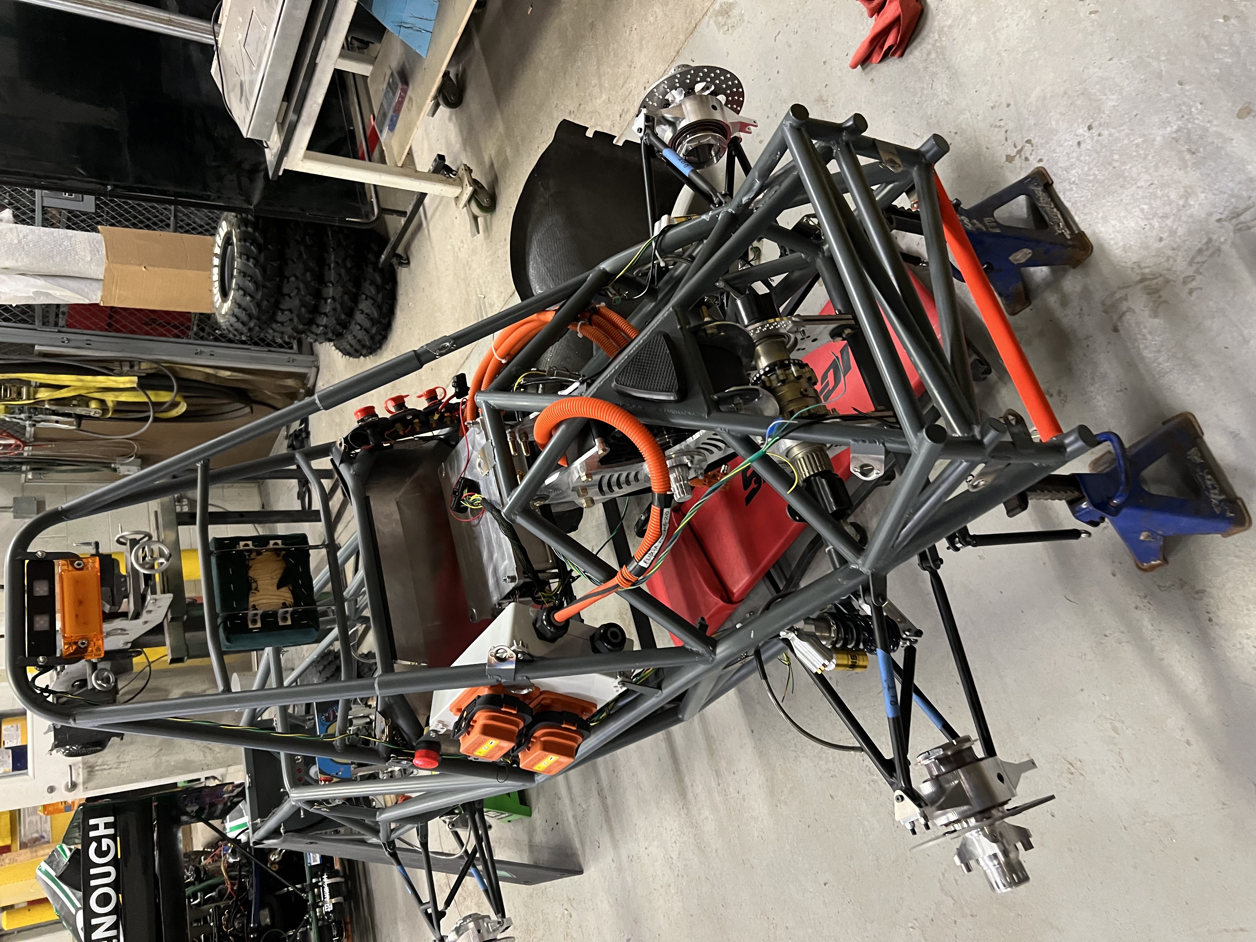 The car being worked on in the shop